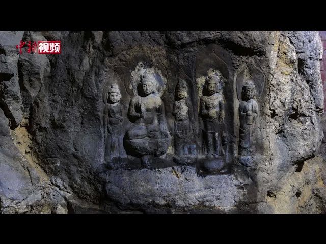 A scenic view of Luliang Shushi Fo Cliff Statue