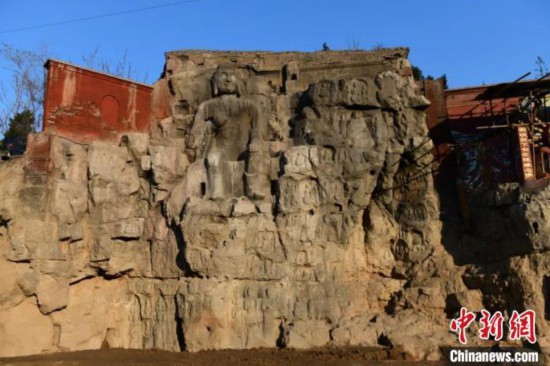 A scenic view of Luliang Shushi Fo Cliff Statue
