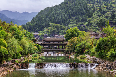 A scenic view of Qiandongnan Sanmentang Gujianzhuqun